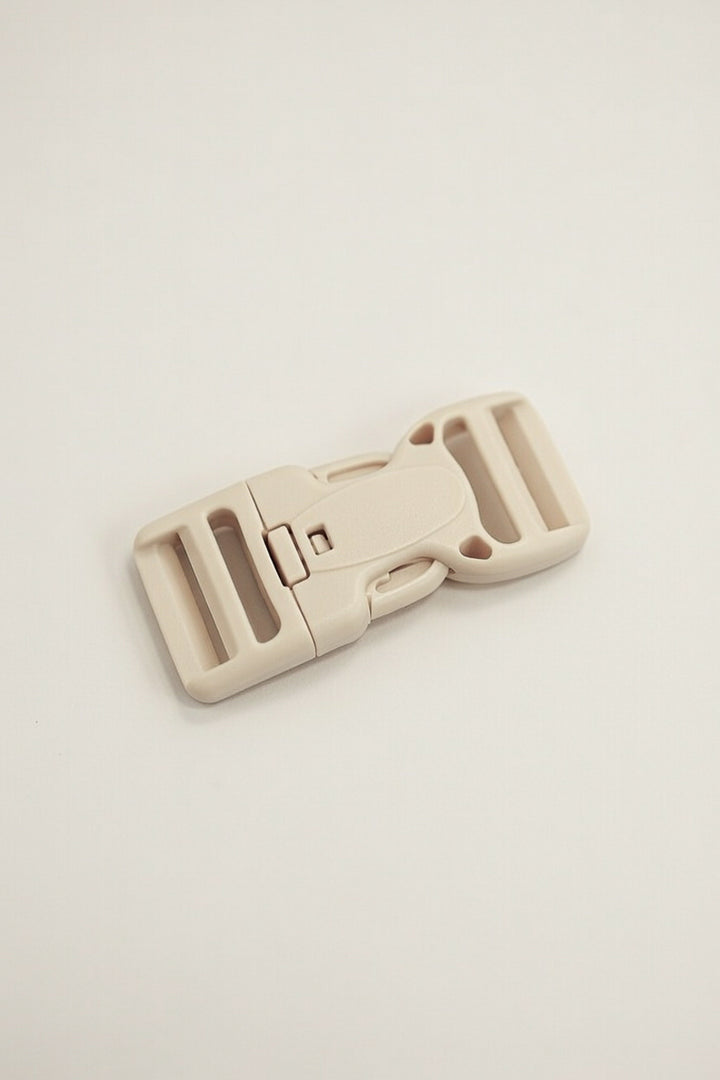 Boucle avec bouton de sécurité 25mm beige