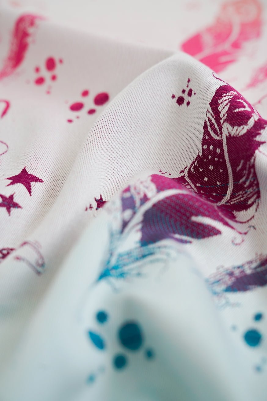 KOKADI Portabebé WrapStar Plumas hanna